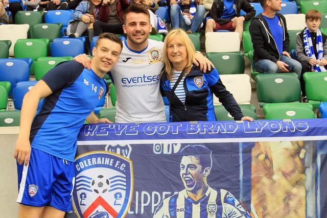 Brad Lyons with his mother Shirley and brother Mark at the 2018 Irish Cup final