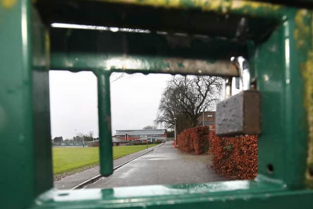 Locked gates at Friend’s School, Lisburn as the Northern Ireland Executive considers how long to keep schools closed