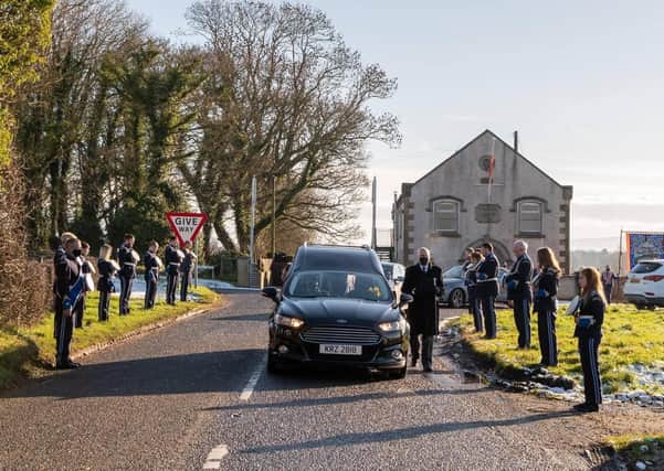 Aghanloo True Blues LOL 656, David’s Brewster’s private lodge, as the hearse carrying him passes their Orange Hall on Sunday. Mr Brewster died last week aged 57