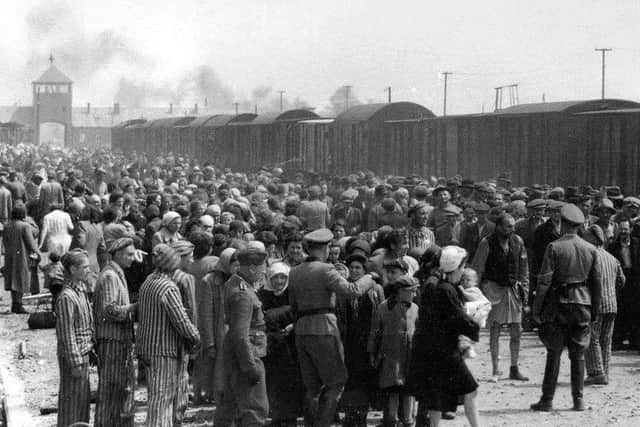 Jews arriving at Auschwitz-Birkenau and being selected for work or the gas chambers. 1944.