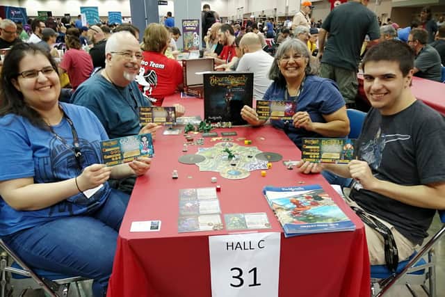 Enjoying MourneQuest at a board game convention