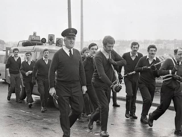 Twenty-four policemen dragged along what usually carried them, a Land-Rover, and all for the sake of charity in January 1982. They pulled the vehicle seven and half miles from Bangor to Donaghadee and raised £535 for the Share project, a holiday establishment for disabled people and their relatives in Co Fermanagh. The men were from number five Divisional Mobile Support Unit, based in Belfast. Chief Inspector Robert Catterson, deputy commander of the DMSU in the city, supervised the operation. Picture: News Letter archives