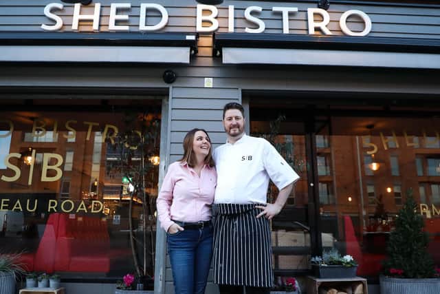 Jonny and Christina Taylor outside the popular The Shed restaurant on the Ormeau Road in Belfast