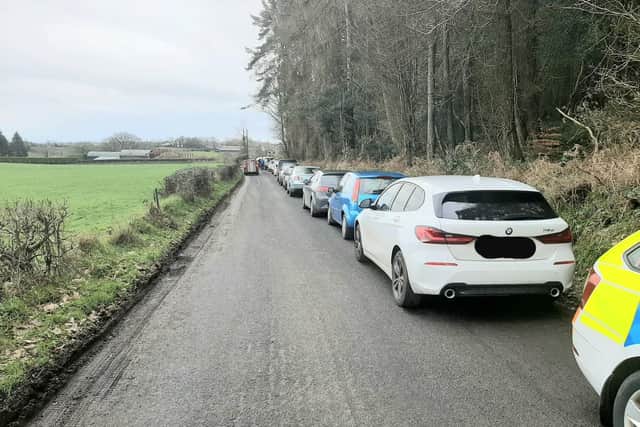 PSNI picture of the parking on the road leading to Iniscarn Forest.