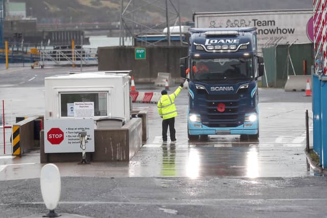 PACEMAKER, BELFAST, 2/2/2021: Trucks arrive at Larne port in Co. Antrim this morning on a ferry from Scotland. PSNI officers are now patrolling the port area after local authority workers were withdrawn from duty at the facility following threats.
PICTURE BY STEPHEN DAVISON
