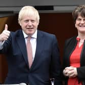 Happier times: 
Boris Johnson with Arlene Foster at Stormont in January 2020.

Photo Colm Lenaghan/Pacemaker Press