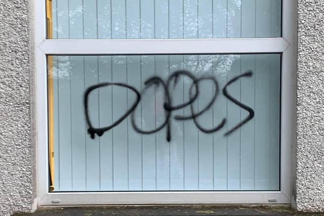Graffiti on a window of the Taylor's Avenue-based centre.