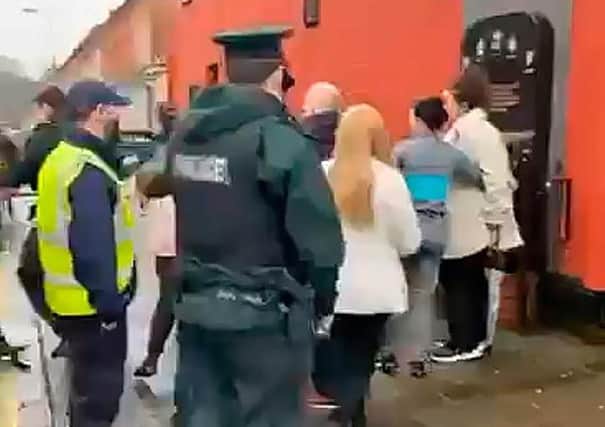 Police made one arrest at a memorial event to mark the 29th anniversary of the UDA murder of five Catholics at Sean Graham's bookmakers on Belfast's Ormeau Road. PACEMAKER BELFAST