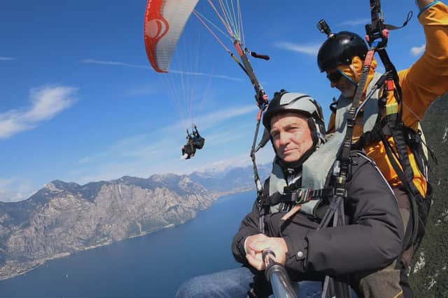Bradley Walsh paragliding from the top of Monte Baldo over the picturesque Lake Garda
