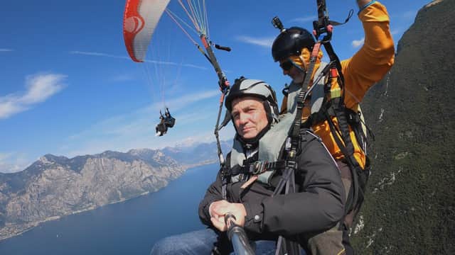 Bradley Walsh paragliding from the top of Monte Baldo over the picturesque Lake Garda