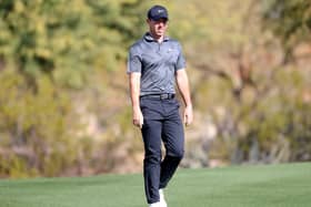 Rory McIlroy of Northern Ireland walks along the second hole during the first round of the Waste Management Phoenix Open at TPC Scottsdale in Scottsdale, Arizona. (Photo by Abbie Parr/Getty Images)