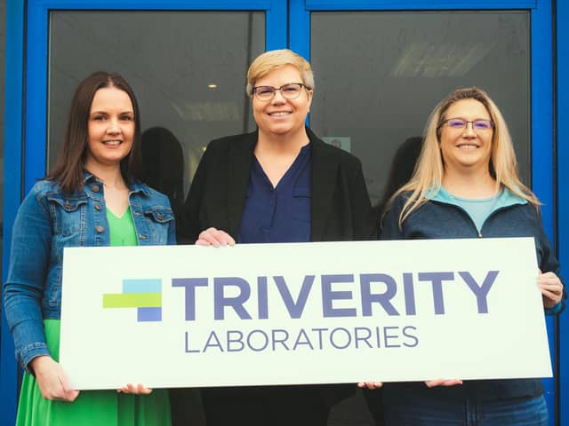 Triverity Laboratories founding members outside their European headquarters in Northern Ireland are Alix Britton, Director of Commercial Operations, Wendi Young, President and CEO, and Heather Krebs, Director of Laboratory Operations
