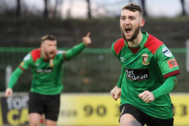 Glentoran's Jamie McDonagh celebrates his late goal against Cliftonville on Saturday. Pic by Pacemaker.