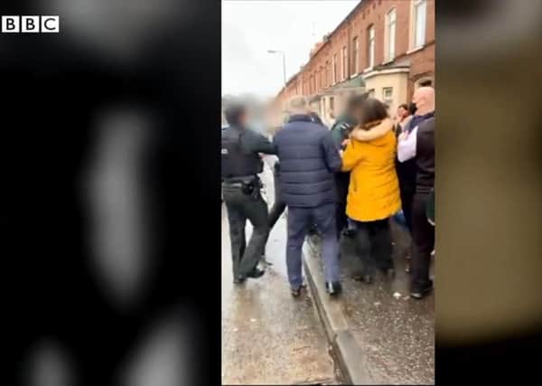 Footage of Friday's incident on the Ormeau Road involving the PSNI was shared online (screengrab taken from a video shared by the BBC)