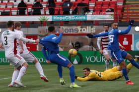 Hamilton Academical's Brian Easton (second left) scores an own goal in the 1-1 draw with Rangers. Pic by PA.