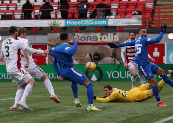 Hamilton Academical's Brian Easton (second left) scores an own goal in the 1-1 draw with Rangers. Pic by PA.