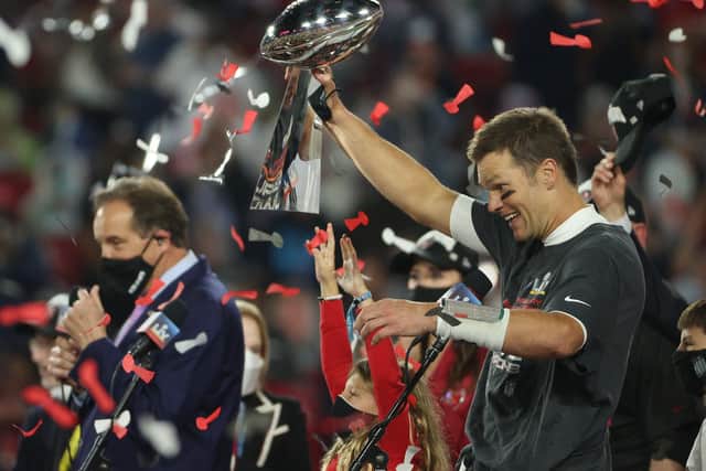 Tom Brady celebrates with the Vince Lombardi Trophy after winning Super Bowl LV. Pic by Getty.