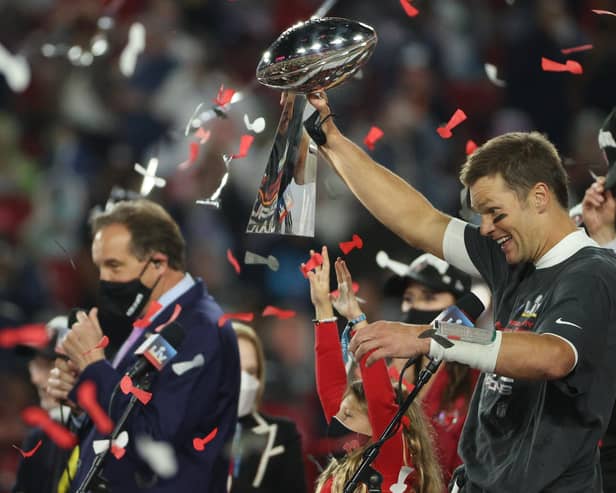 Tom Brady celebrates with the Vince Lombardi Trophy after winning Super Bowl LV. Pic by Getty.