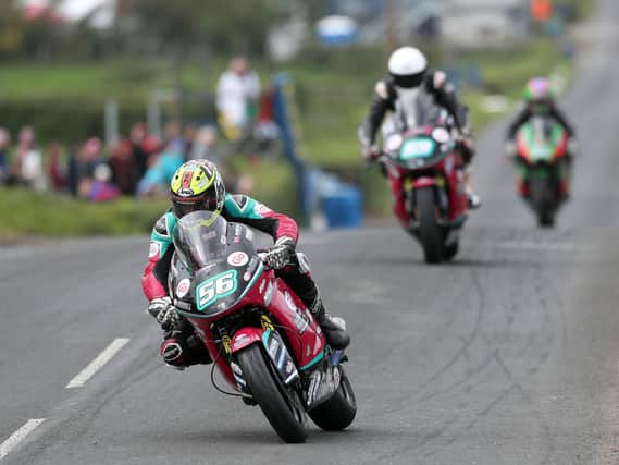 Adam McLean leads his McAdoo Racing team-mate Darryl Tweed in the Supertwin race at the Cookstown 100 last year.