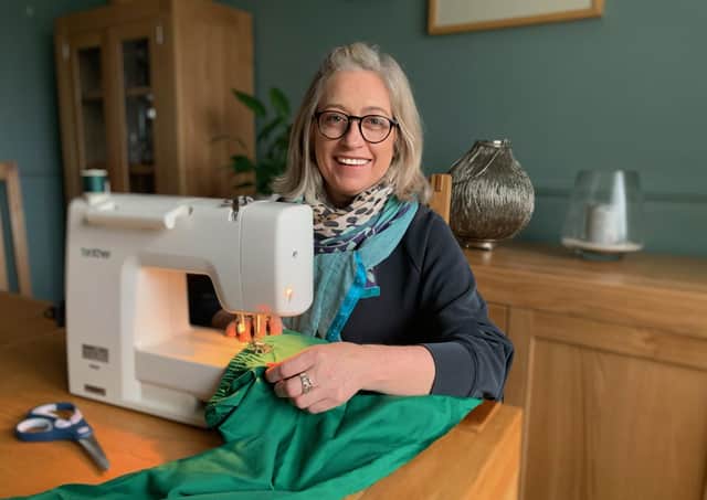 Linda Murray with her mum's sewing machine