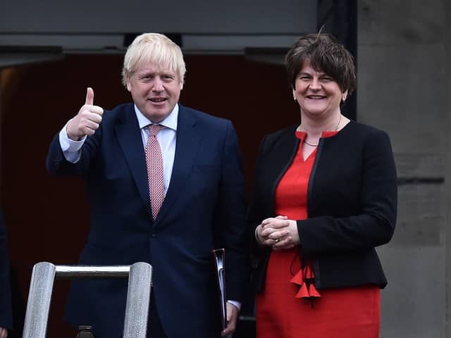 Boris Johnson and Arlene Foster at Stormont on its return, in January 2020. Mrs Foster and her party are fiercely criticising his Irish Sea border yet as recently as last month she described it as a "gateway of opportunity". A DUP minister's department built it, the DUP voted to ban British soil from NI, and the DUP in 2019 agreed to a regulatory border