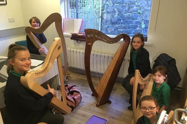 Students from Dunseverick Primary School have been learning the harp under the guidance of Katy Bustard from Causeway Harp School. Thanks to funding from the Arts Council of Northern Ireland's Musical Instruments Programme, the school has been awarded £6,00 to purchase seven new harps for students