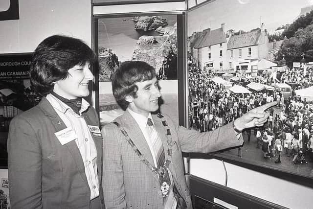 The deputy Mayor of Larne, Councillor T D Robinson, with Christine Campbell of Moyle District Council at the Glens of Antrim stand at the Holiday and Leisure Show in January 1982. Picture: News Letter archives