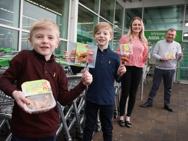 Brothers Kyle and Jude with Laura Wills, New Product Development Manager for Finnebrogue & Robert Ryans, General Store Manager Asda Antrim
