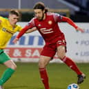Ben Tilney (right) during Saturday's 1-1 draw with Cliftonville at Shamrock Park. Pic by Pacemaker.