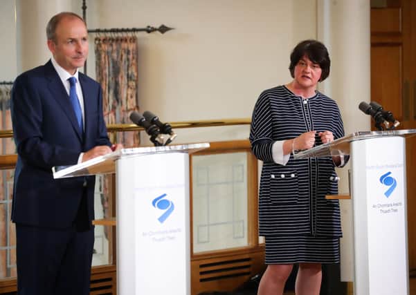 Taoiseach Micheal Martin with Arlene Foster at a North South Ministerial Council meeting in Dublin last summer, weeks before Mr Martin launched a Shared Island Unit