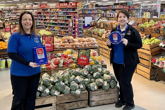 Produce Manager Beverley Atkinson is pictured with Laura Purvis from JC Stewart and their Retail Industry Award for Fresh Produce Retailer of the Year