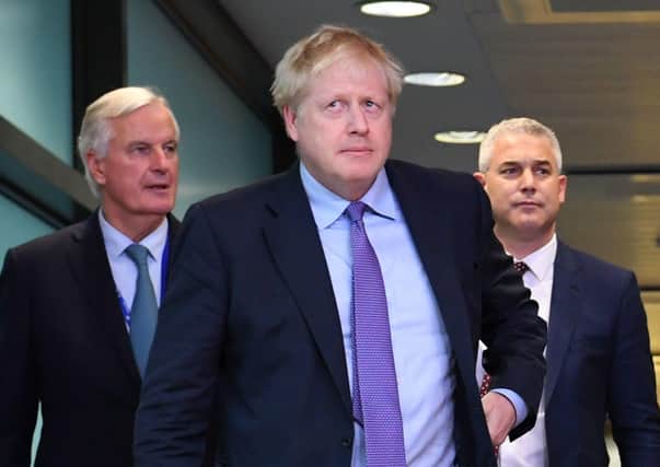 The EU Brexit negotiator Michel Barnier with the UK prime minister Boris Johnson after the 2019 Brexit deal, which created the Irish Sea border. If Mr Barnier is to feel any pressure, which is possibly doubtful given the unionist inaction, the EU must made to feel in serious error of the platitudes it espouses after its breach of international law