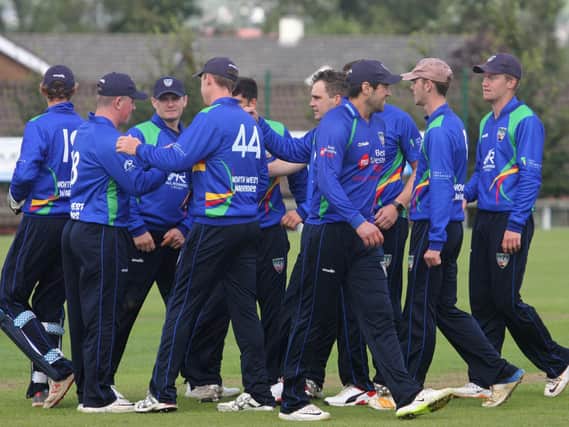 North West Warriors celebrate the wicket of James McCollum during their interprovincial game against the Northern Knights. Picture by Barry Chambers
