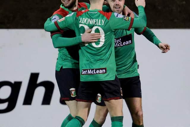 Glentoran’s Conor McMenamin celebrates his goal