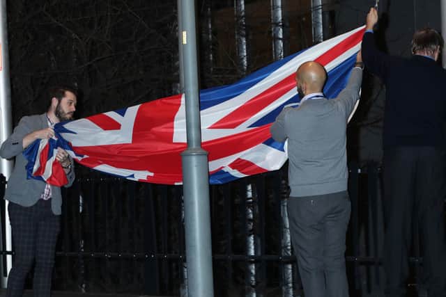 The Union Flag is taken down outside the European Parliament in Brussels ahead of the UK leaving the European Union on January 31 last year