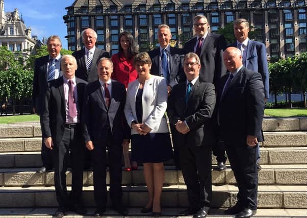 Arlene Foster in 2017 with her 10 DUP MPs, who in early October 2019 backed a regulatory Irish Sea border, but only if Stormont pre approved it