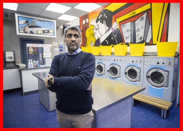 Sanjay Khanna proprietor of Spin City Belfast, and Mint Dry Cleaners in Belfast in one of his shops