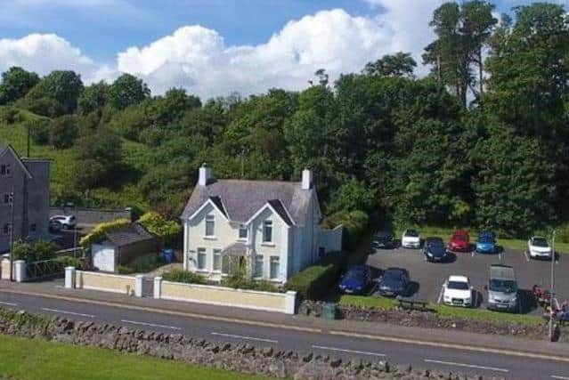 This superb detached family home is located on the famous Antrim Coast Road
