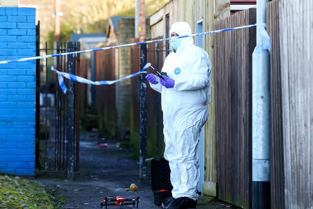 The scene at Hopewell Crescent in the Shankill Estate area of north Belfast where a man was a man in his twenties was injured in a shooting late on Sunday night