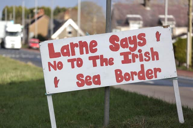 Anti-Irish Sea Border signs in the Larne area.