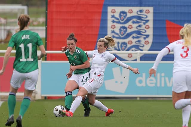 Northern Ireland's Abbie Magee and England's Lauren Hemp during the International friendly between the two sides at St. George's Park, England.
