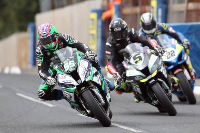 Michael Sweeney (65) leads Thomas Maxwell (5) and Paul Jordan in the Superbike race at the 2020 Cookstown 100.