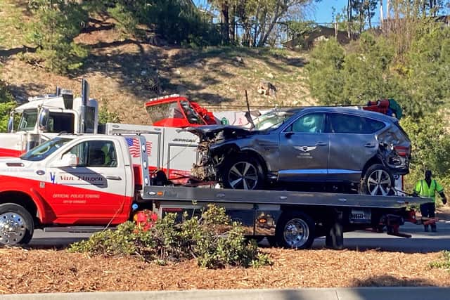 The vehicle driven by Tiger Woods on the back of a truck in Los Angeles after he suffered leg injuries when the vehicle rolled over.