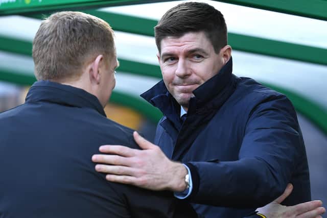 Rangers manager Steven Gerrard (right) with Neil Lennon during an Old Firm meeting against Celtic. Pic by Getty.