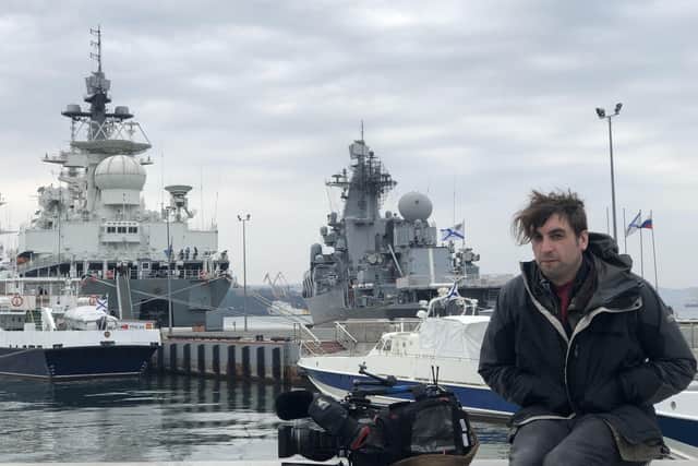 David works for BBC's Ireland Bureau in Belfast. He is pictured here in Vladivostok for the Putin/Kim summit