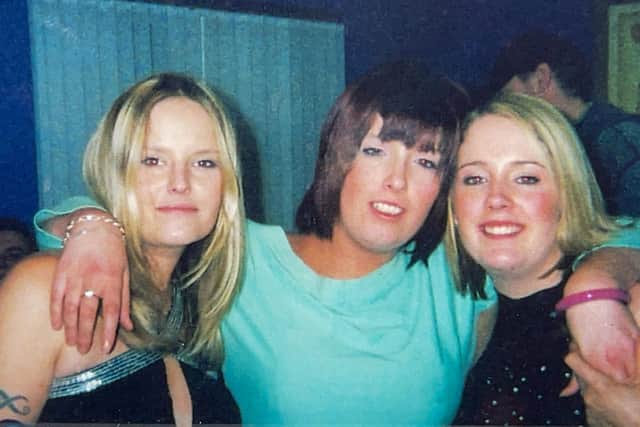 Family handout photo of Lisa Dorrian (left) with her sisters Michelle (centre) and Joanne (right) at a house warming party in Bangor, in 2004