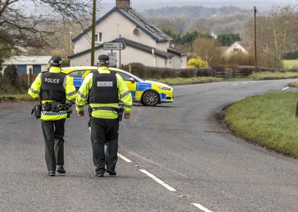 31/01/21.. MCAULEY MULTIMEDIA..PSNI and ATO at the scene of two security alerts on the banks of the River Bann, Agivey near Ballymoney. It is believed PSNI are investigating reports of a bomb below the Agivey Bridge and second device on the Glenstall Road nearby.Pic Steven McAuley/McAuley Multimedia