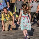 Co Down-born army major Chris Brannigan being greeted by daughter Hasti in Edinburgh at the end of his 700-mile barefoot trek from Land's End in Cornwall last August