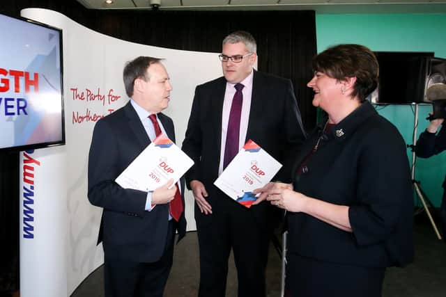 The DUP Deputy leader Nigel Dodds, MP Gavin Robinson and leader Arlene Foster seen in 2019. They met with the Loyalist Communities Council on Thursday. 

Picture Matt Mackey / Press Eye