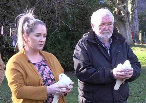 Joanne and John Dorrian, the sister and dad of missing Co Down woman Lisa Dorrian, release two doves in memory of the 25-year-old to mark the 16th anniversary of her death. Photo: Rebecca Black
